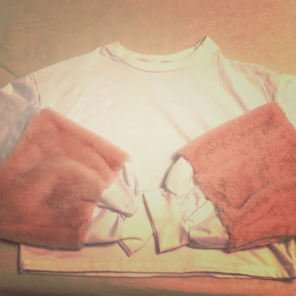White Crop Top with pink fur on sleeves.